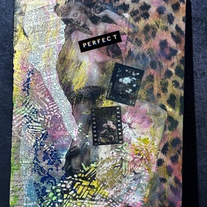 May include: A rectangular mixed media art piece featuring a central classical figure collage, a black label with the white text PERFECT, leopard print patterns, vintage book page fragments, blue floral motifs, and two small strips of photographic film.