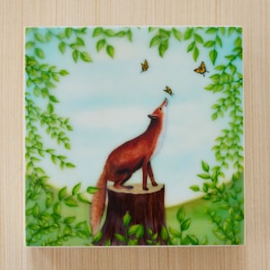 May include: A red fox sits on a tree stump in a forest clearing, looking up at three yellow butterflies flying in the blue sky. Green leaves frame the scene.