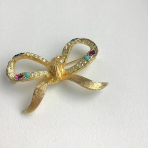 WEISS Vintage Bow Brooch. Gold with Emerald and Ruby colored stones and Turquoise Beads. Estate Find in Canada.