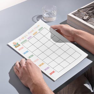 May include: A printable baby meal planner with a cute cartoon baby on the cover. The planner has columns for breakfast, lunch, dinner, and snacks, and rows for each day of the week.