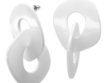 1 paire de boucles d'oreilles en plastique blanc