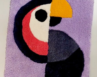 Custom, handmade and extremely soft, high-quality rug showing an illustrated beautiful parrot.