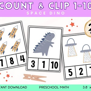 May include: Counting cards with a space theme. The cards feature illustrations of rockets, a dinosaur in a spacesuit, and UFOs. Numbers 1-10 are displayed with corresponding quantities. Includes 20 cards, each measuring 9.65cm x 12.7cm.