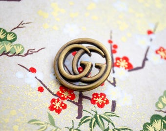 Vintage Gucci Bronze Metal Buttons. 2 sizes