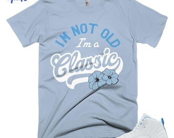 AJ 12 Melo blauw wit ijsgrijs Im klassieke shirtkleur bijpassende sneaker, Bella canvas shirt