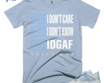 AJ 4 Forget Me Not blauwwit ijsgrijs IDGAF-shirt kleur passend bij sneaker, Bella canvas shirt