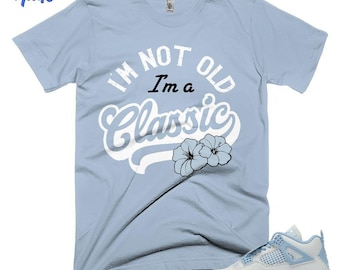 AJ 4 Forget Me Not Blauw, ijsgrijs, wit, klassieke shirtkleur, bijpassende sneaker, canvas shirt Bella