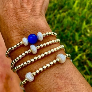 Pulseira empilhável em ouro 14k: pérola cultivada. Não mancha. Inspirada em E. Newton. imagem 6