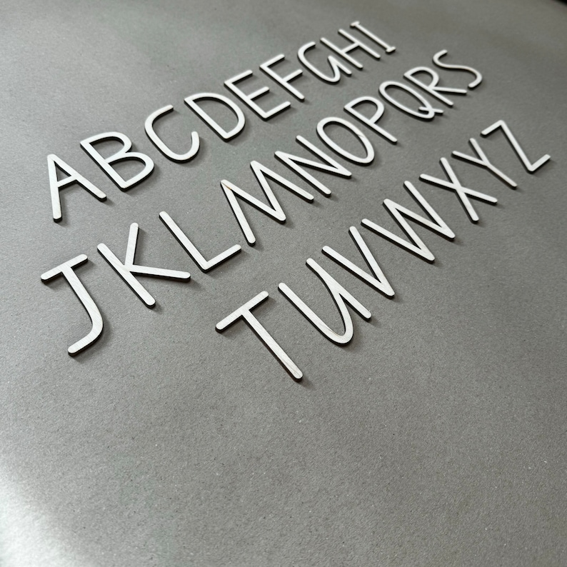 Movable english alphabet uppercase letters in queensland qld font for