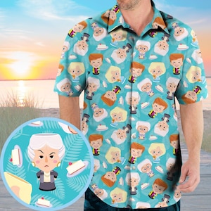 Pode incluir: Camisa de manga curta com fundo turquesa e um padrão repetido de personagens de desenhos animados e fatias de bolo. A camisa tem gola e é feita de um tecido leve, perfeita para o clima quente.