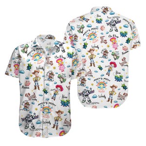 May include: White short-sleeved shirt with a vibrant pattern of cartoon characters such as Woody, Buzz Lightyear, and Bo Peep. The shirt has a classic collar and features the text "Andy's Room".