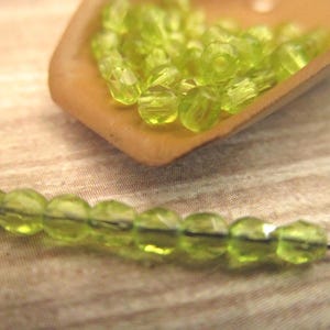 2mm Faceted Round Olivine Green Czech Glass Bead Fire Polished 50pc