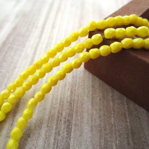 2mm Faceted Round Matte Custard Luster Iris Czech Glass Bead Yellow  50pc