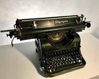Authentic Olympia MOD 8 Typewriter - A Timeless Relic of Craftsmanship