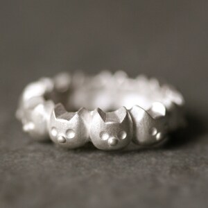 Kitty Eternity Band Ring in Sterling Silver