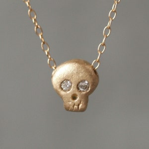 Baby Skull Necklace in Gold with Gemstones