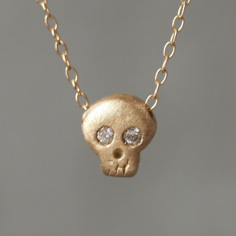 Baby Skull Necklace in Gold with Gemstones image 1