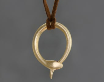 Snake Tail Necklace in Brass with Rubies on Sueded Cord