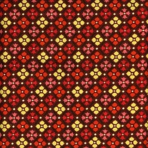 May include: A brown fabric with a repeating pattern of red, yellow, and pink flowers. The flowers are stylized and have a geometric shape.