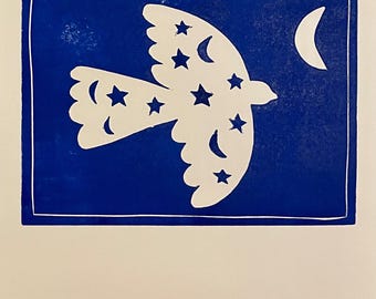 May include: A white bird illustration with star and crescent moon cutouts against a blue background. The bird is in flight, with a crescent moon and stars filling its body. A white crescent moon is in the upper right corner.
