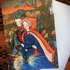 May include: A vintage-style illustration of a couple walking through a graveyard at night. The woman is wearing a red hooded cloak and a blue dress, while the man is wearing a brown coat and a hat. They are carrying lanterns and walking towards a small church in the distance.