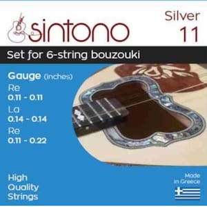 May include: A set of three ceramic mugs with a speckled, matte finish. The mugs are in shades of cream, light gray, and dark gray. Each mug has a simple, minimalist design, perfect for coffee or tea.