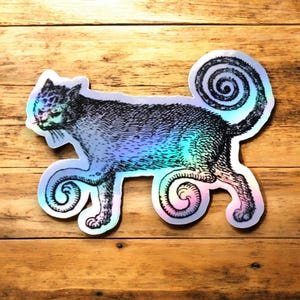 Autocollant holographique chat spirale dessin d'un livre de la Renaissance, medieval spiral cat holographic sticker