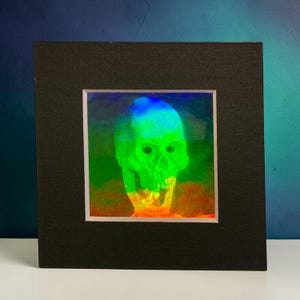 Mini marco holográfico con calavera animada riendo – holograma en relieve de los años 90 – curiosidad óptica retro – marco de 8 × 8 cm (3,15 pulgadas)