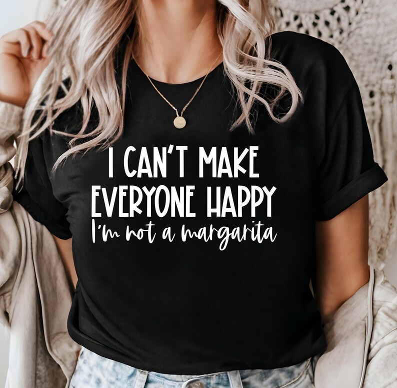 May include: Black t-shirt with white text that reads "I can't make everyone happy I'm not a margarita".