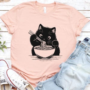 Cat Noodles Tee, Funny Kitty T-Shirt, Cat Lover Gift, Animal Graphic Shirt, Cute Feline Eating Ramen Shirt, Tee for Cat Owners, Cute Cat Tee