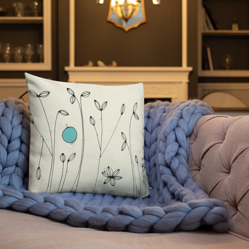 Decorative modern throw pillow for the couch with turquoise accents and abstract flower design on a white background, 18x18 image 7