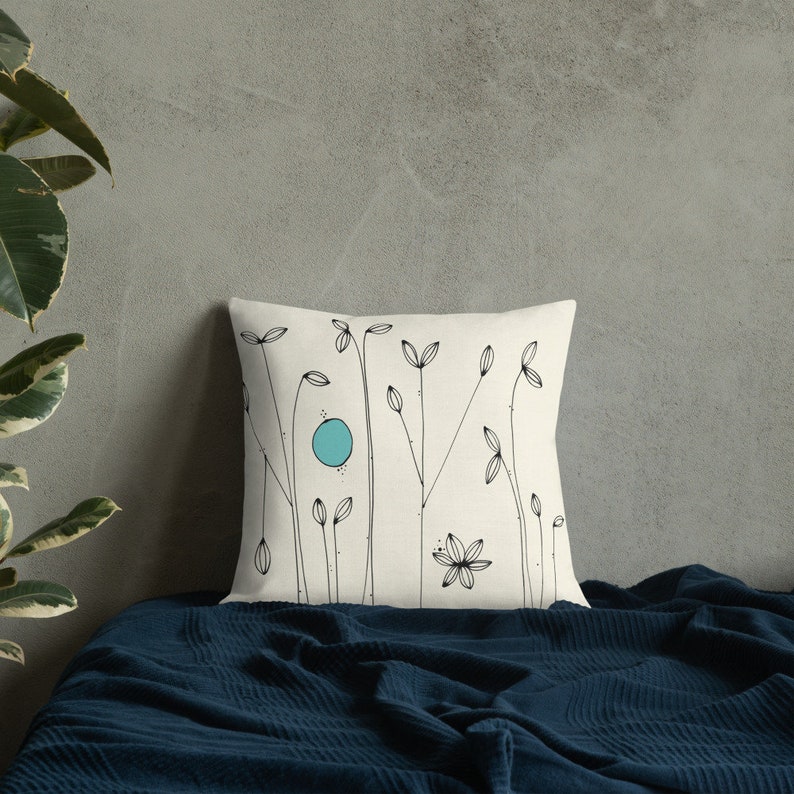 Decorative modern throw pillow for the couch with turquoise accents and abstract flower design on a white background, 18x18 image 8
