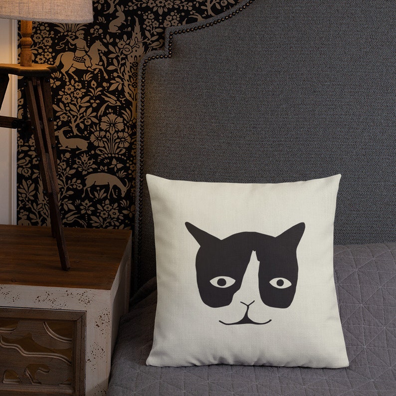 Black and White Tuxedo Cat Design with black lines on a white background as a couch or bed pillow