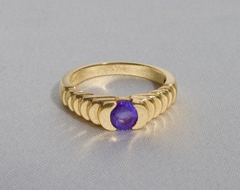 Bague pyramide succession avec pierre tanzanite