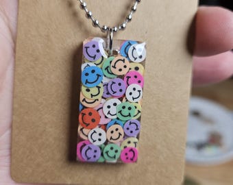 COLGANTE DE CHISPAS SONRIENTE