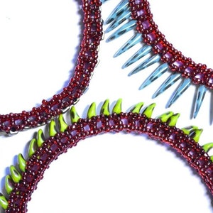 May include: Three beaded necklaces with red, green and blue accents. The necklaces are made with small beads and have a unique, spiky design.