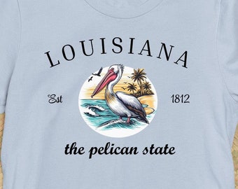 Luisiana el estado pelícano, pájaro estatal de Los Ángeles, pájaro de pico grande, cigüeña, camiseta gráfica con eslogan del estado de Pelícano LA