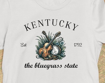 Kentucky el estado de Bluegrass, gran estado de la música, KY Banjos, KY Blue Grass, KY State Slogan Graphic Tee Shirt