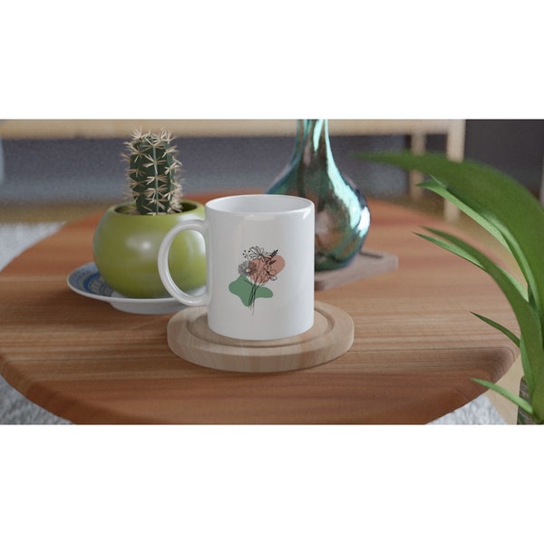 Weiße Keramiktasse avec Blumenmuster