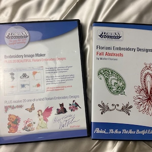 May include: Two Floriani Embroidery Designs DVD cases. One case reads "Embroidery Image Maker" and features sample designs. The other case is titled "Fall Abstracts" and displays embroidery patterns. Both cases are in black DVD cases.