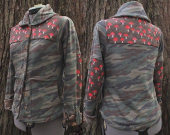 Amanita camp jacket. Camouflage and mushroom print chore coat with elbow patches & multiple pockets. Button front layer w sweatshirt feel.