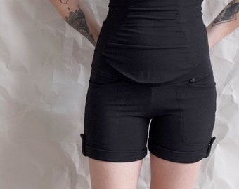 Black cuffed shorts with 4 pockets. Durable and eco friendly, stretchy shorts perfect for yoga, hiking, biking, lounging, or being cute AF..