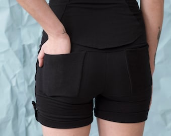 Black shorts with 4 pockets. Durable, stretchy shorts with rollup cuffs for adjustable length. Choose your waistband, tall or short.