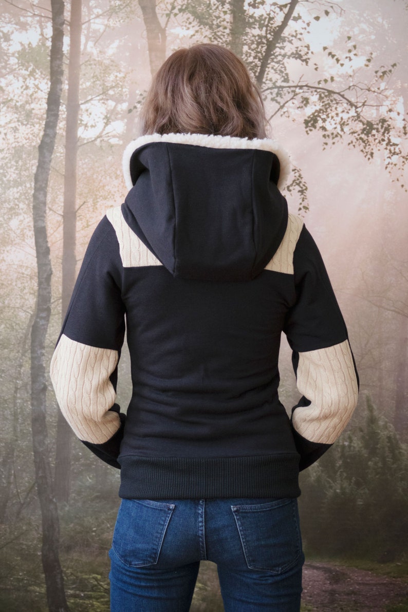 The Fargo Hoodie in black ecofriendly bamboo french terry and cable knit sweater accents. Faux fur lined hood and vegan leather accents. image 5