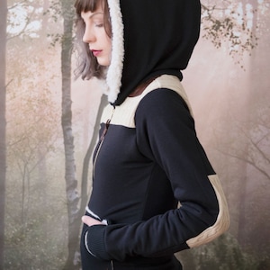 The Fargo Hoodie in black ecofriendly bamboo french terry and cable knit sweater accents. Faux fur lined hood and vegan leather accents. image 1