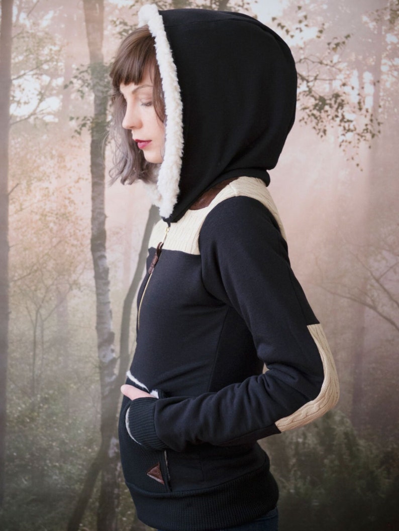 The Fargo Hoodie in black ecofriendly bamboo french terry and cable knit sweater accents. Faux fur lined hood and vegan leather accents. image 1
