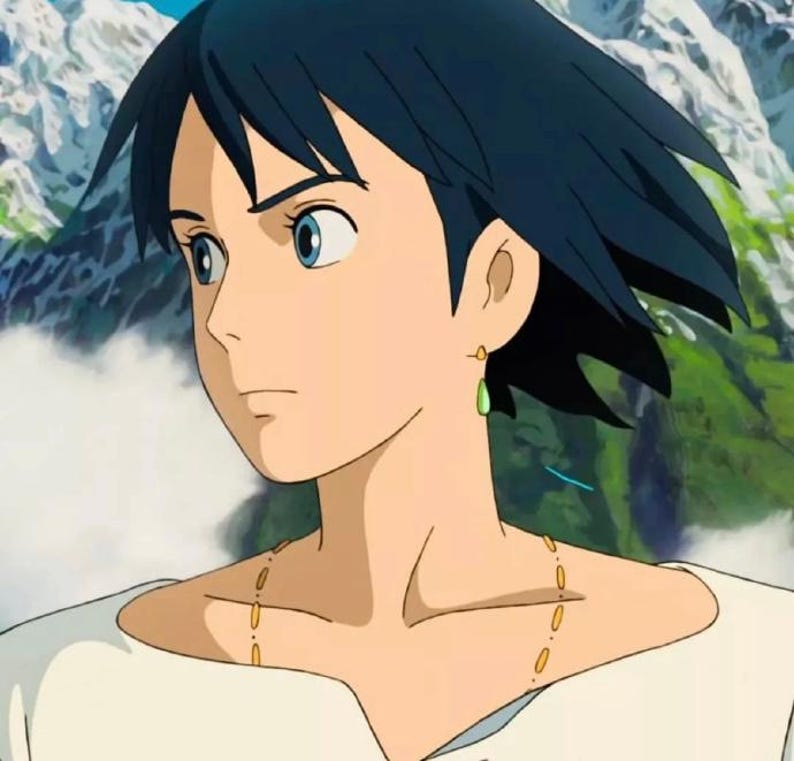 May include: An animated character with dark blue hair and blue eyes, wearing a white shirt and a gold necklace. The character has a green teardrop-shaped earring. The background shows a mountain landscape.