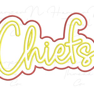 May include: An embroidery design featuring the word Chiefs in a yellow cursive script font. The text is outlined with a thick white border and a final red outer edge, creating a layered effect suitable for machine embroidery applications.