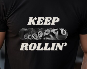 May include: Black t-shirt with a white graphic of billiard balls and the text "KEEP ROLLIN'"