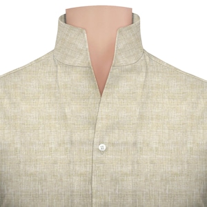 May include: Close-up of a light beige linen shirt with a mandarin collar. The shirt has a button closure and a textured appearance. The collar is a distinctive feature, standing up around the neck.
